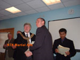 Sensei Andy receiving his FSMA from Cliff Morris (Mayor of Bolton)