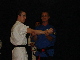 Master Davy Hogan demonstrates on Mark.